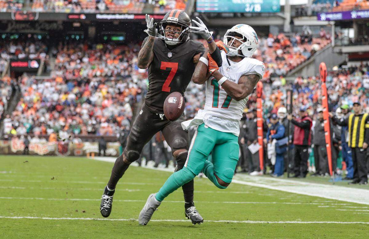 Cleveland Browns Tysen Brown (7) deflects the pass intended for Miami Dolphins wide receiver Jaylen Waddle (17) in the endzone during the first half of an NFL football game at Huntington Bank Field in Cleveland, Ohio, on Sunday, October 19, 2025.