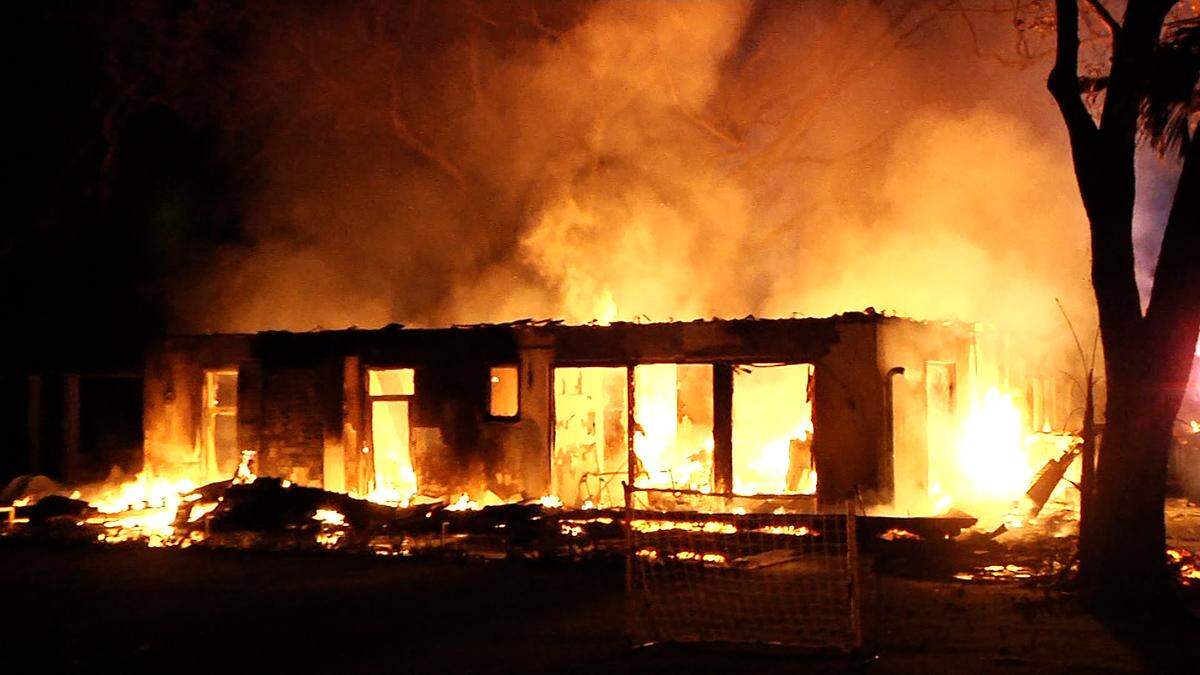 Miami-Dade Fire Rescue crews battle a blaze early Thursday at a home believed to belong to Miami Heat coach Erik Spoelstra near Ponce and Davis roads. Fire officials said they received the call about the fire at 4:36 a.m. Wednesday at a single-family residence at 4875 SW 80th St. in Miami.