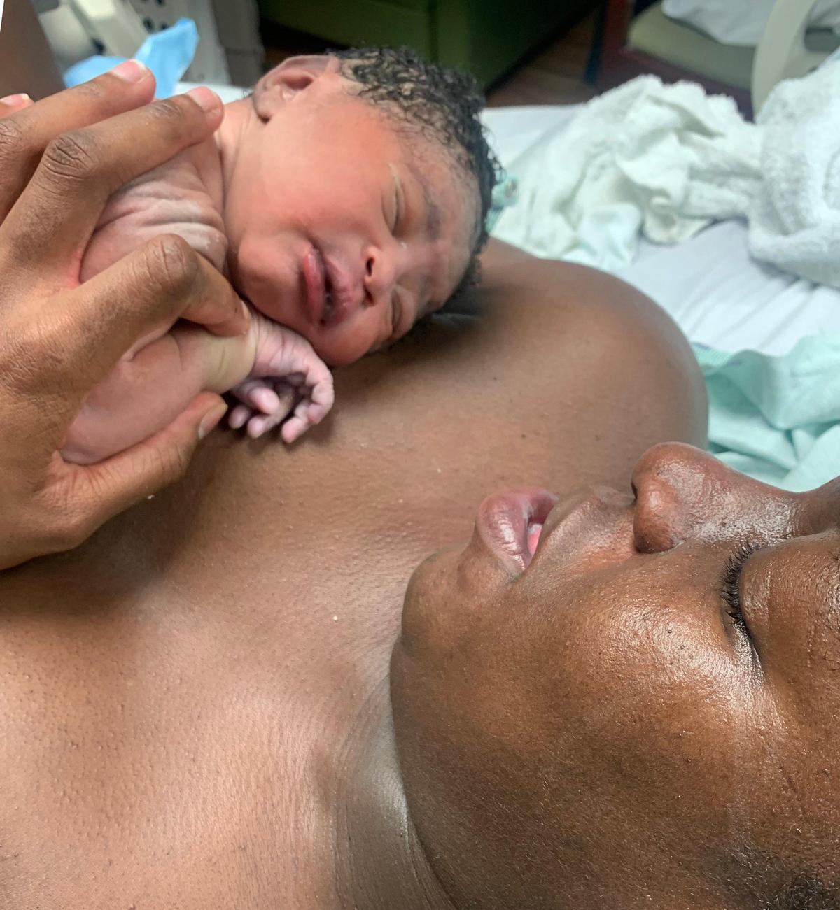 Remy D’Or Costume arrived at 6:51pm on May 14, 2020, weighing in at 6lbs6oz and 18inches long. Mom, Alena Costume, holds Remy in the delivery room at Memorial Hospital West in Pembroke Pines.