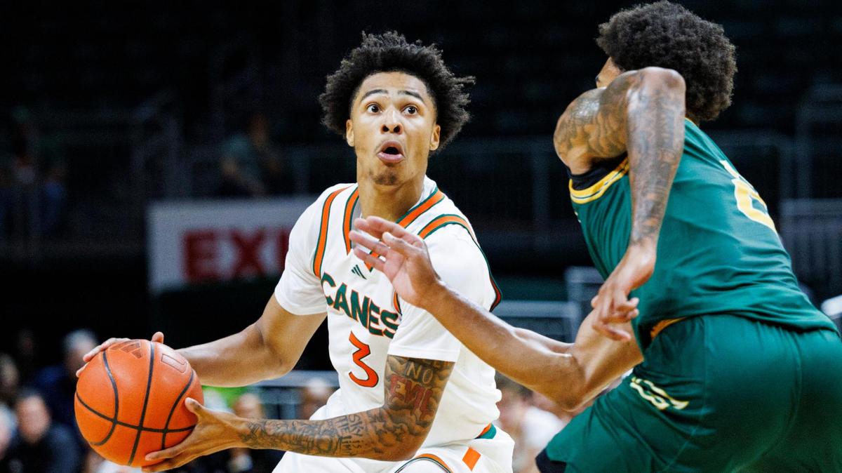 Hurricanes Jalil Bethea (3) dribbles the ball down the court against Saint Leo’s Eric Jones (2) during the first alf of a game on Wednesday, Oct. 30, 2024, at Watsco Center at the University of Miami in Coral Gables, Fla.