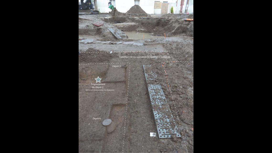 Three other deposits were found in the ruins of a 14th century masonry building, according to officials.