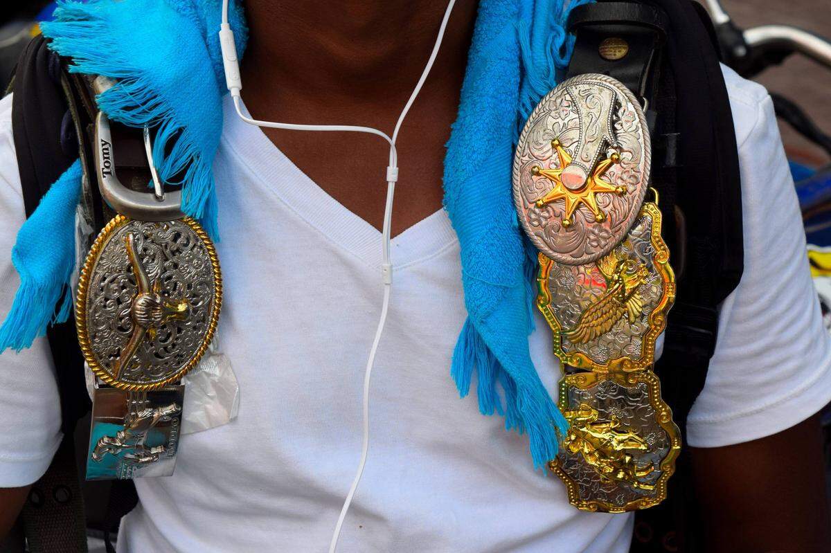 A man sells belts in Yoro, Honduras. Local authorities believe about 20 percent of the residents of the town in central Honduras have emigrated to the United States or have a family member who has. People here say the Trump administration's 'zero tolerance' policy toward migrants is making them think twice about embarking on a journey to the United States.