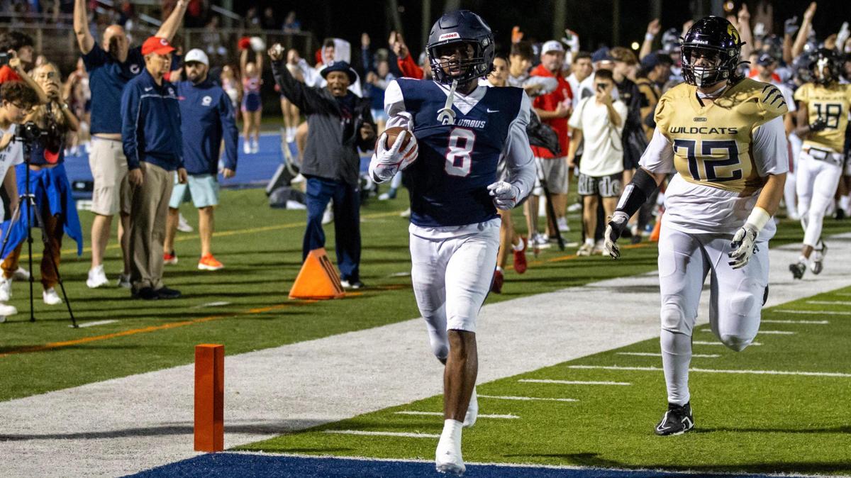 Columbus free safety Bryce Fitzgerald (8) scores on a pick-six during the fourth quarter of the Region 4-4M final against Western at Tropical Park in Miami, Florida, on Friday, November 24, 2023.