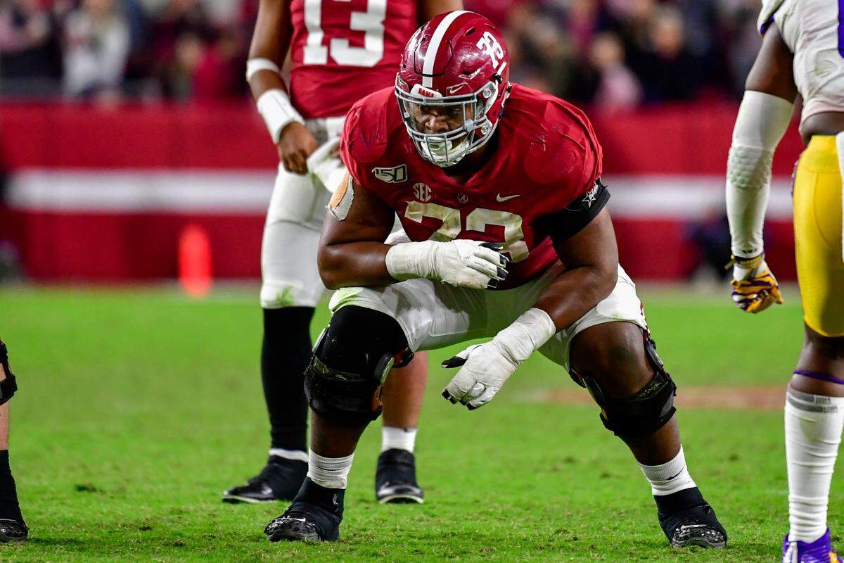 FILE - Alabama offensive lineman Evan Neal (73) gets set against LSU during the second half of an NCAA football game in Tuscaloosa, Ala., in this Saturday, Nov. 9, 2019, file photo. Neal in Tuscaloosa, Ala. Neal was selected to The Associated Press Preseason All-America first team offense, Monday Aug. 23, 2021. (AP Photo/Vasha Hunt, File)