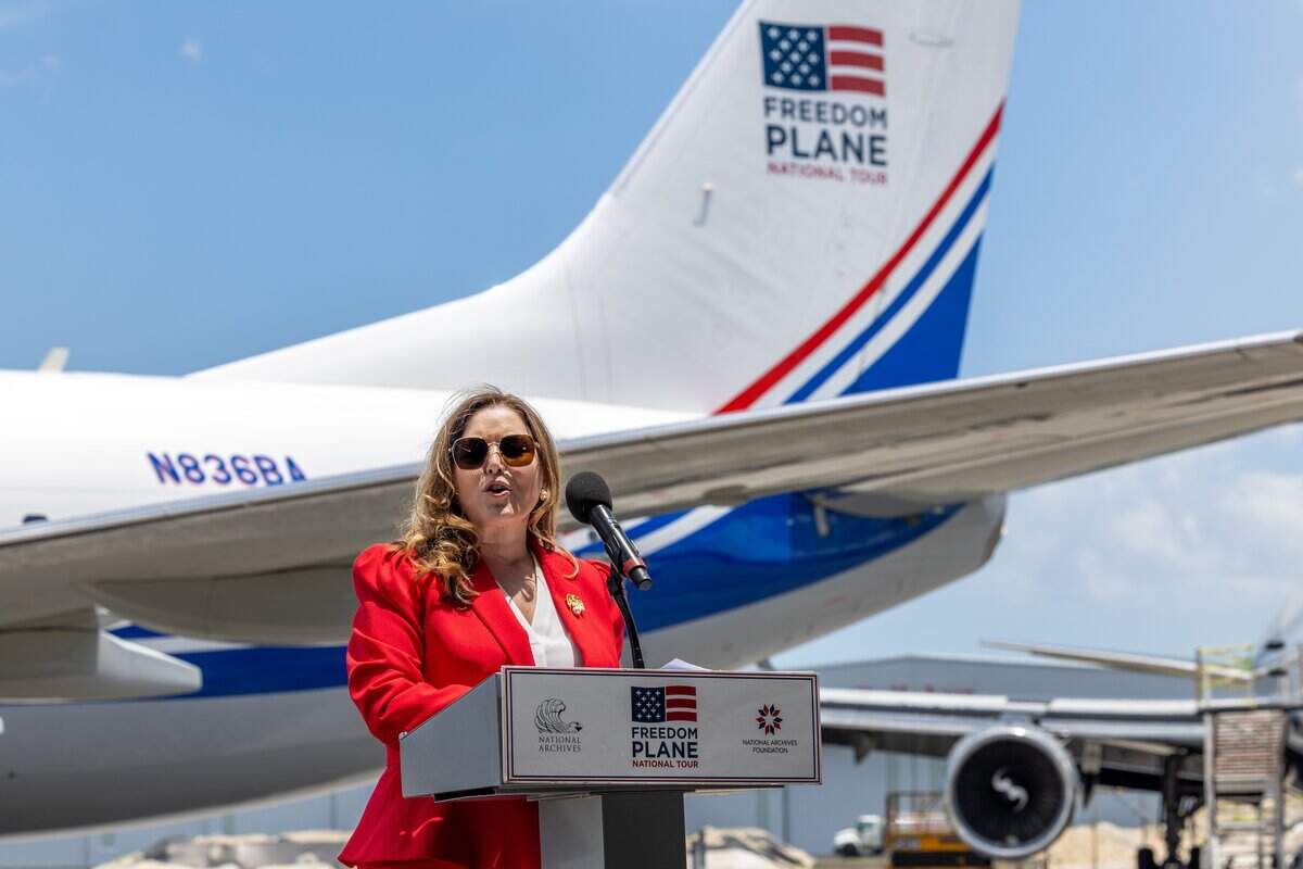 Natalia Crujeiras, CEO of the Museum of Miami, speaks during a ceremony marking the transport of founding documents for the 250th anniversary celebration of American independence at Opa-locka Airport in Opa-locka, Fla., on Monday, June 15, 2026.