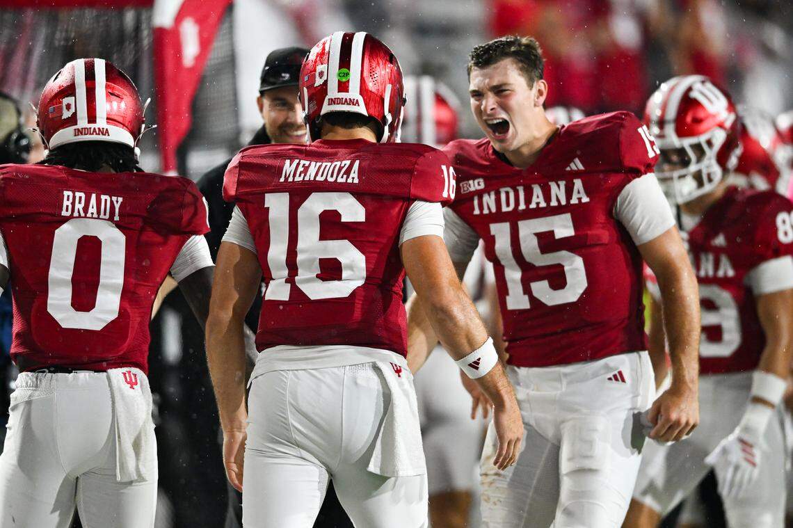 Indiana Hoosiers QB Alberto Mendoza (16) celebrates a touchdown with his brother, QB Fernando Mendoza (15) during a college football game between the Illinois Fighting Illini and Indiana Hoosiers on September 20, 2025 at Memorial Stadium in Bloomington, IN.