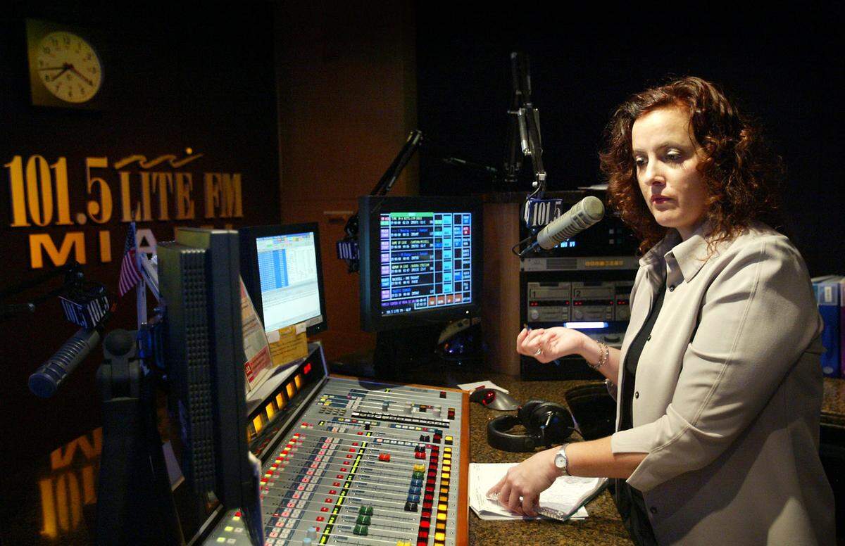 In this file photo from Jan. 8, 2003, Kimba, the then-newest DJ at LITE FM, helped LITE become the first all-female radio station in South Florida, perhaps in the nation. Kimba checked her agenda as she does her show at LITE FM. The former South Florida rock jock had a soft rock evening program at LITE FM.