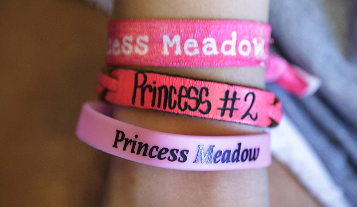 Carley Ogozaly wears bangle bracelets to honor her best friend Meadow Pollack as she gets ready for the prom at Marjory Stoneman Douglas High on Saturday, May 5, 2018.  Meadow, a senior, was one of 17 students and educators  killed in the Feb. 14 shooting at Marjory Stoneman Douglas High School in Parkland.