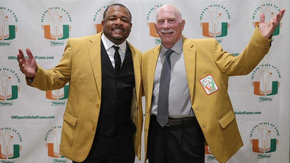 Track & Field inductee Tim Harris Jr. and inductee coach Mike Ward pose together during the University of Miami Sports Hall of Fame Induction Banquet at the Doubletree by Hilton Miami Airport ConventionCenter in Miami, Florida on Thursday, April 21, 2022.