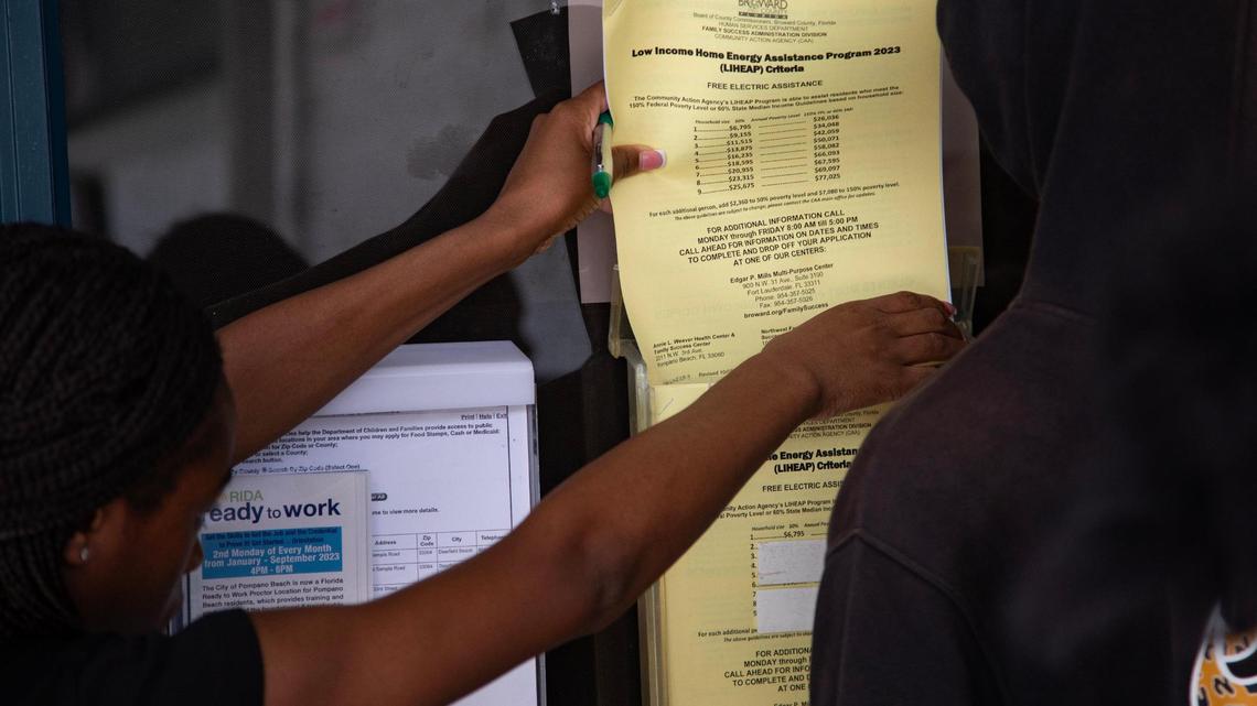 Paperwork for LIHEAP, a light bill assistance program, pictured outside Annie L. Weaver Health Center in Pompano Beach, Fla., on Thursday, July 20, 2023.