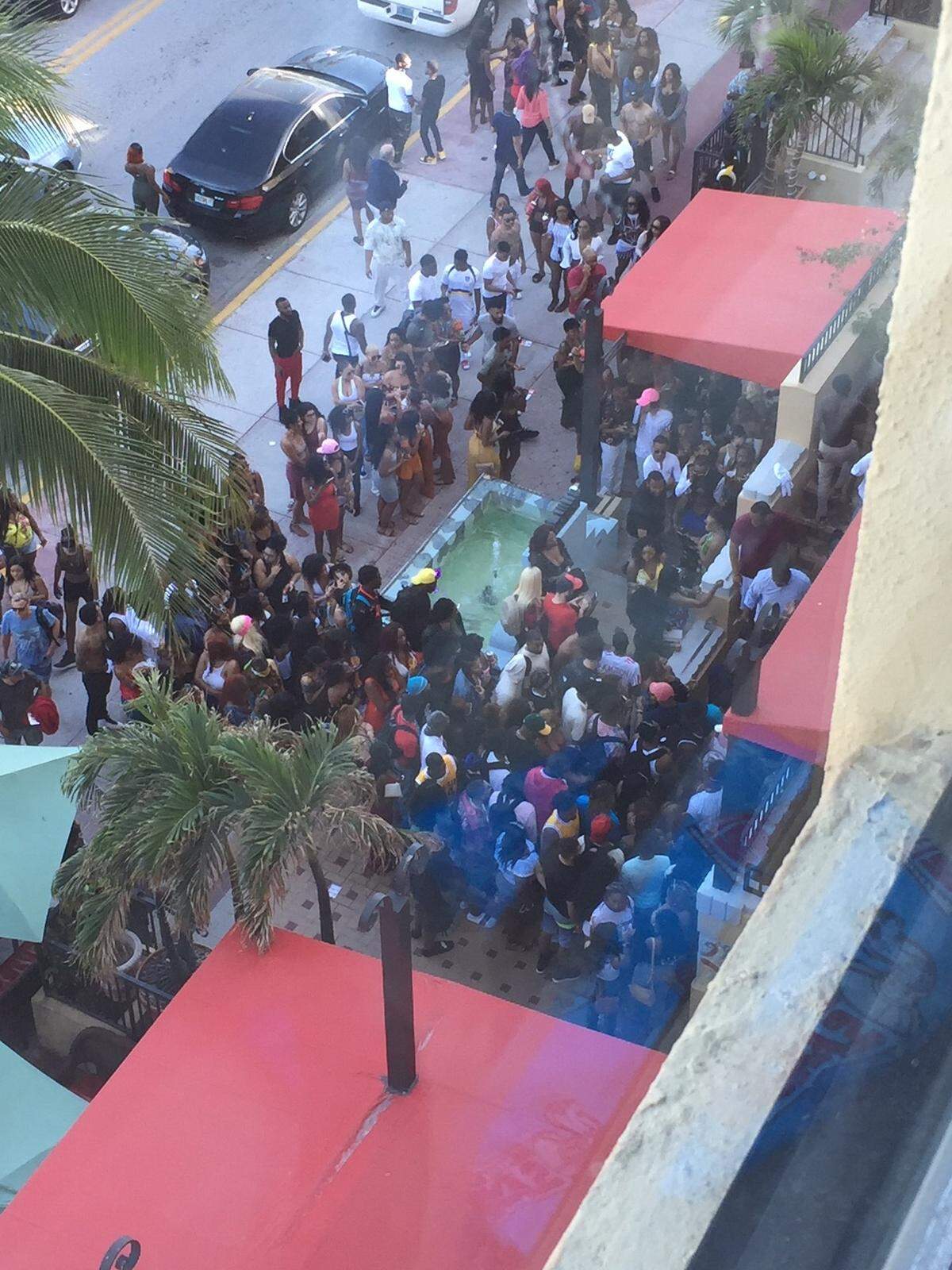 Crowds outside V-Live club on Ocean Drive. Condo owners in the building where the club is located have complained to city officials about the crowds.