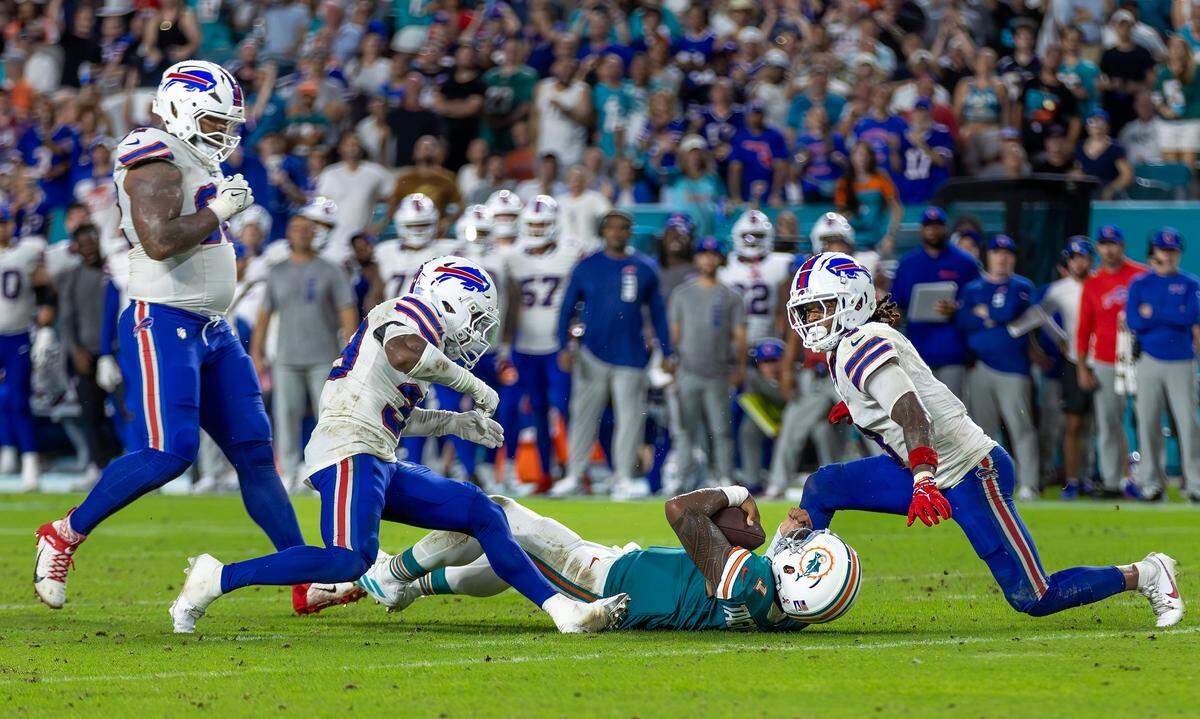 Miami Dolphins quarterback Tua Tagovailoa (1) suffers a concussion after a play against the Buffalo Bills in the second half of their NFL game at Hard Rock Stadium on Thursday, Sept. 12, 2024, in Miami Gardens, Fla.