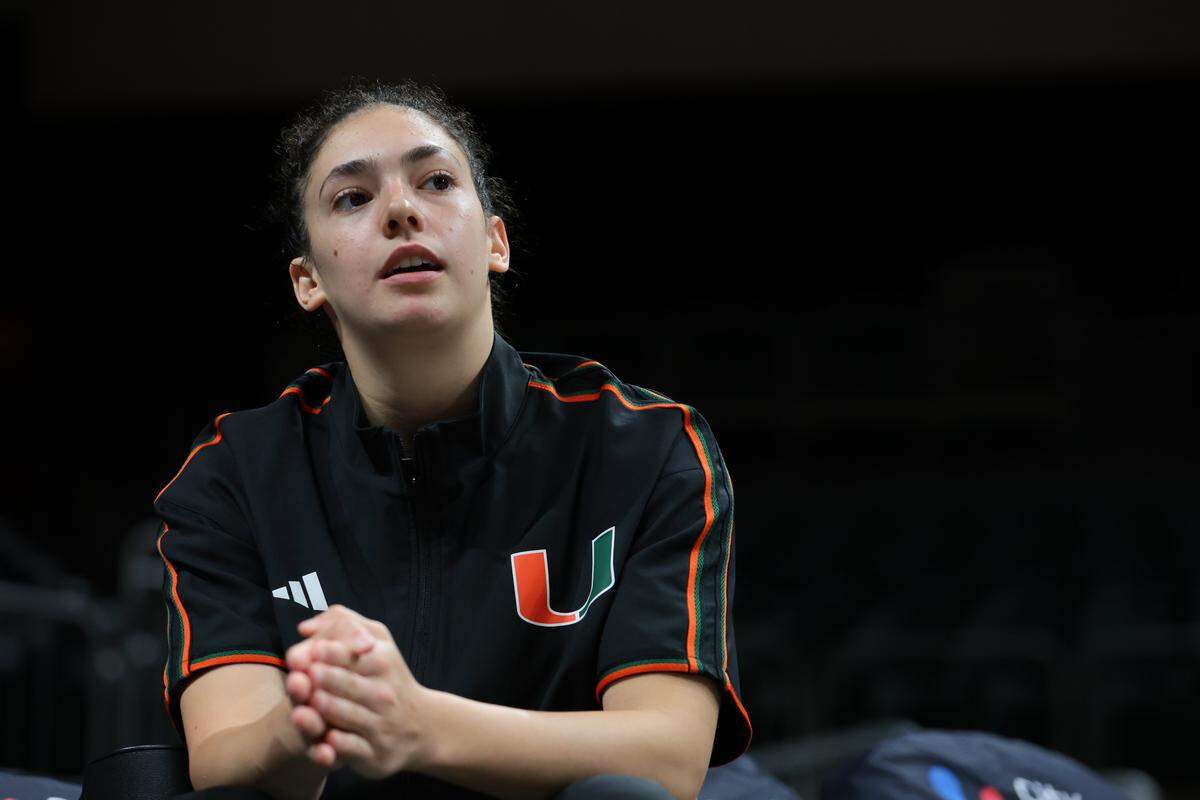 Miami Hurricanes guard Gal Raviv (14) speaks about her experience representing Israel at the FIBA U19 Women's Basketball World Cup after practice at the Watsco Center in Coral Gables, Florida, Tuesday, October 28, 2025. 