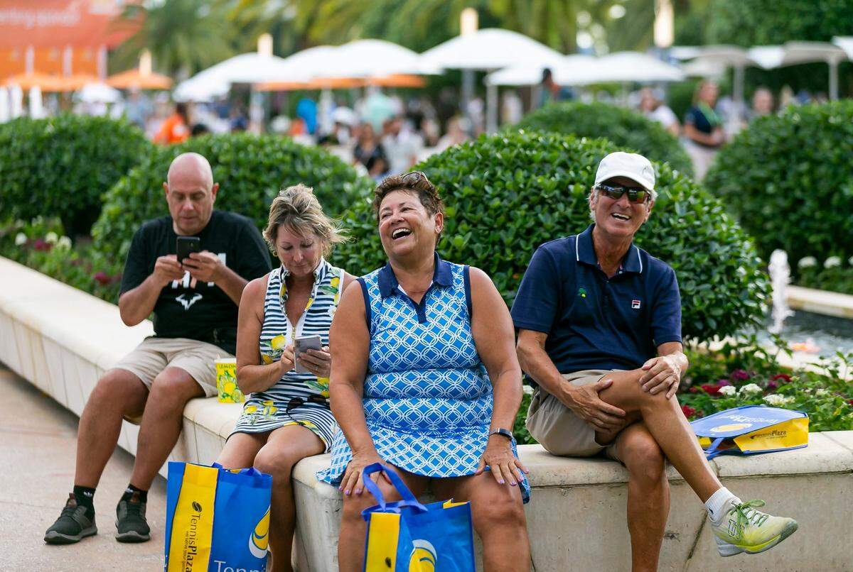 Visitors attend the Miami Open tennis tournament on Thursday, March 24, 2022 at Hard Rock Stadium in Miami Gardens, Florida.