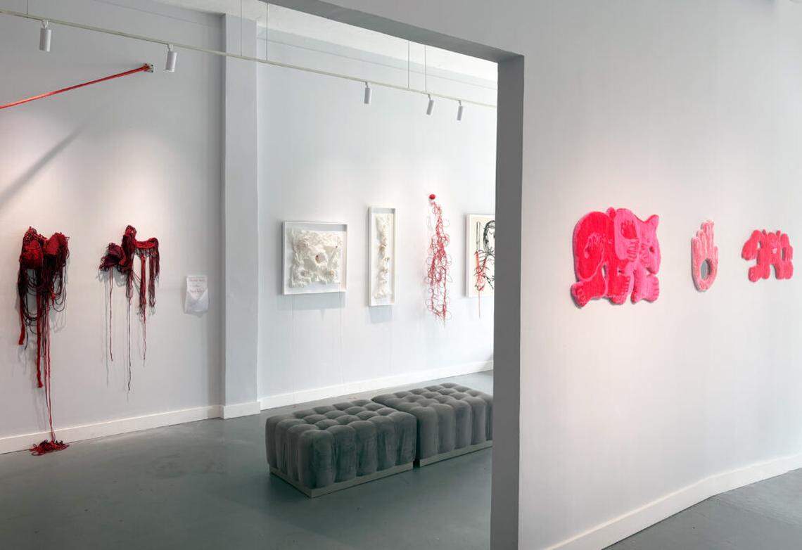 “Under the Red Tent” at The CAMP Gallery in North Miami brings together 20-plus women artists in a collaborative fiber exhibition exploring identity and community.