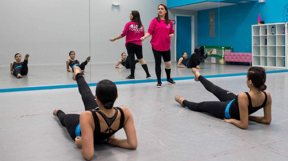 Ascendance Studio co-owner Valentina Bagala instructs clients Isabela Sarreiro, Maryangel Chacin, Alex Calvo and Fiorenza Bagala.