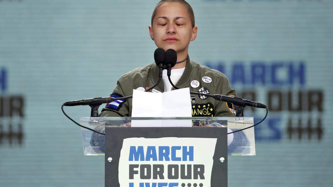 Emma Gonzalez, a survivor of the mass shooting at Marjory Stoneman Douglas High School in Parkland, Fla., closes her eyes and cries as she stands silently at the podium for the amount of time it took the Parkland shooter to go on his killing spree during the “March for Our Lives” rally in support of gun control in Washington, Saturday, March 24, 2018.