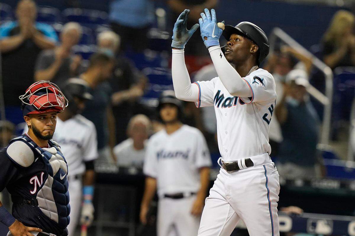 Miami Marlins’ Jazz Chisholm Jr. gestures to the crowd after hitting his second solo home run of the game during the fifth inning of a baseball game against the Washington Nationals, Monday, Sept. 20, 2021, in Miami.