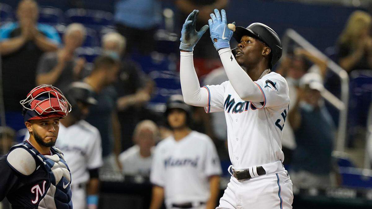 Miami Marlins’ Jazz Chisholm Jr. gestures to the crowd after hitting his second solo home run of the game during the fifth inning of a baseball game against the Washington Nationals, Monday, Sept. 20, 2021, in Miami.