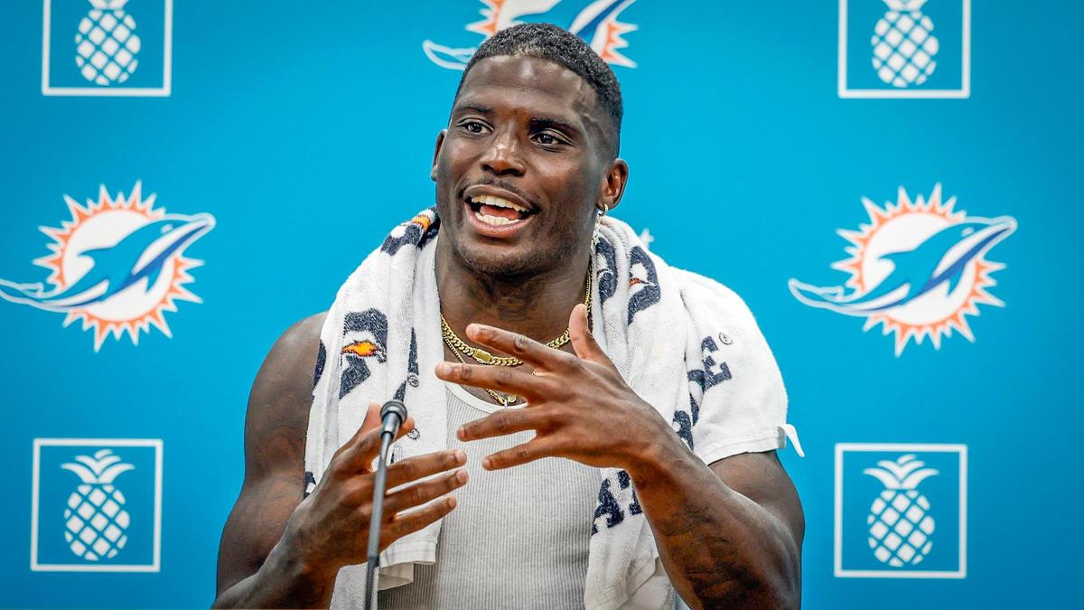 Miami Dolphins wide receiver Tyreek Hill (10) speaks to reporters during a press conference at the Miami Dolphins Training Camp in Miami Gardens, Florida, on Tuesday, July 22, 2025.