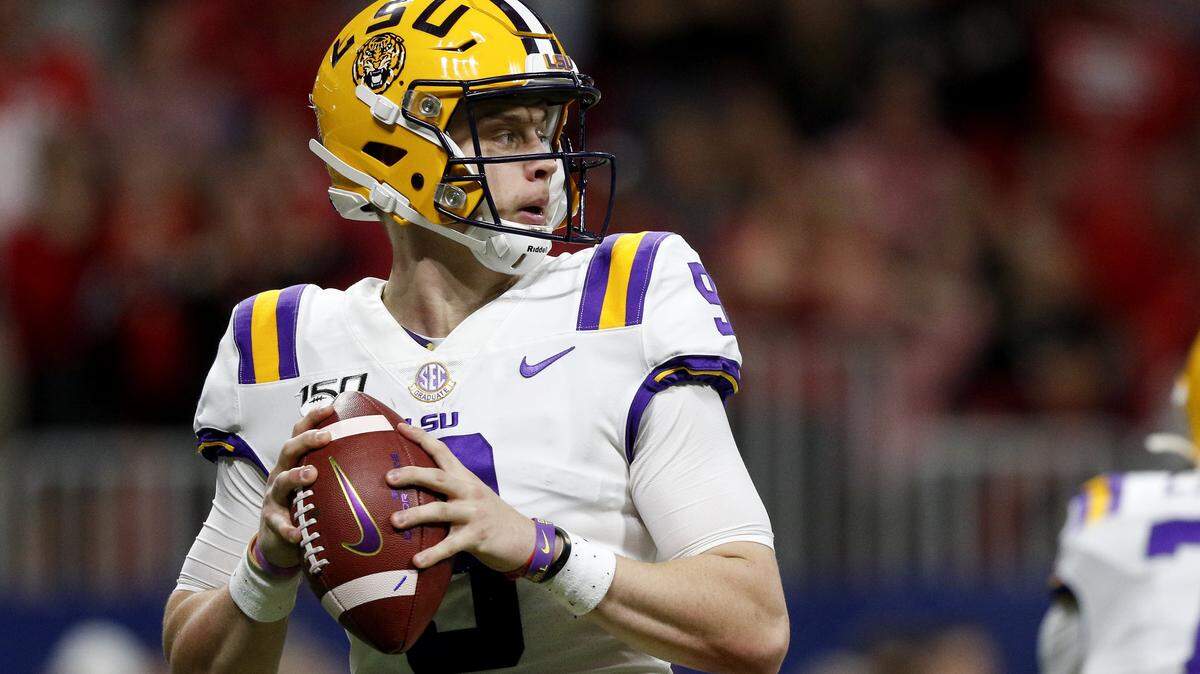 LSU quarterback Joe Burrow (9) looks to pass against Georgia during an NCAA college football game for the Southeastern Conference championship Saturday, Dec. 7, 2019, in Atlanta, Ga. (C.B. Schmelter/Chattanooga Times Free Press via AP)