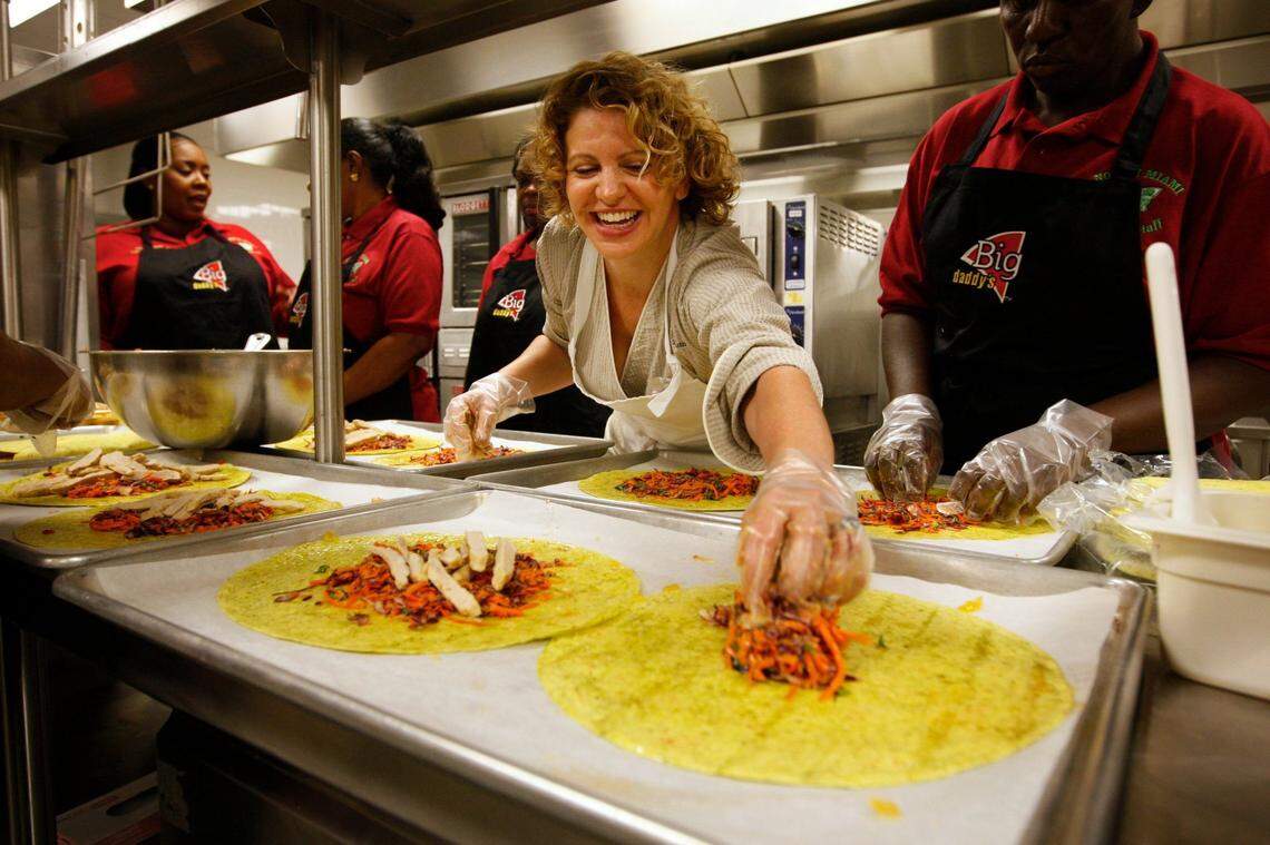 Chef Michelle Bernstein returned to her alma mater North Miami Senior High to show cafeteria cooks how to make chicken-veggie wraps in 2010.