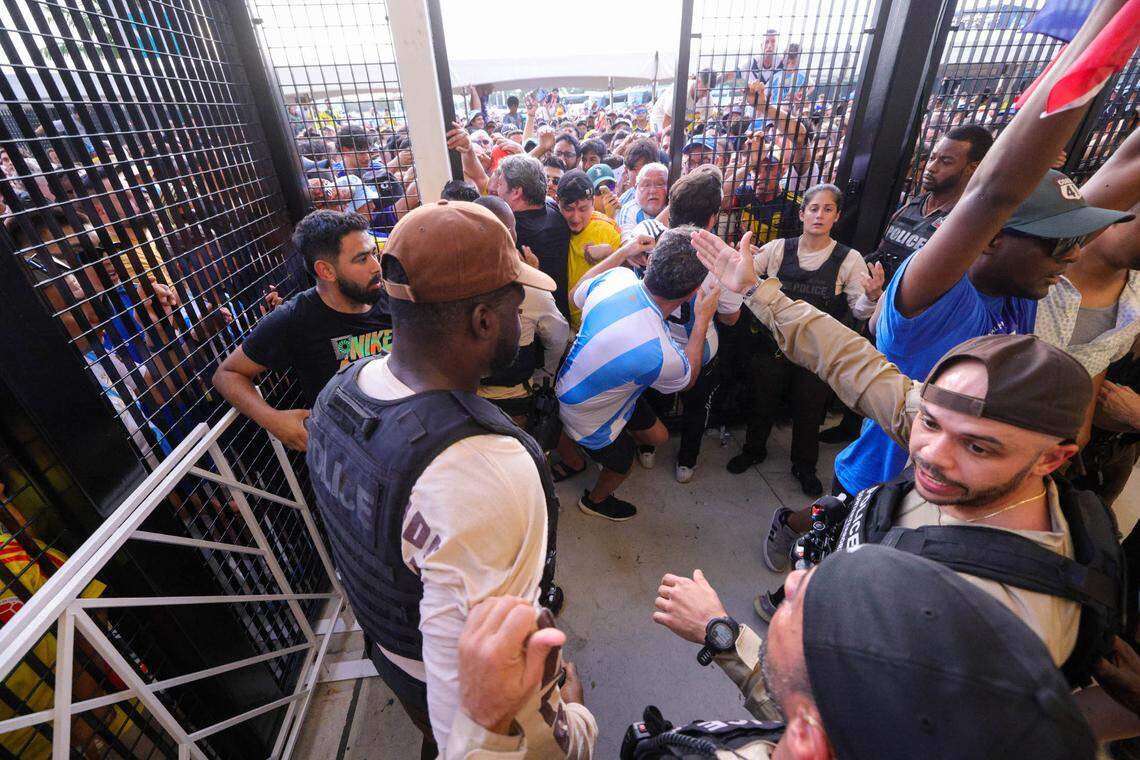 July 14, 2024; Miami, FL: Fans rush the gates before the Copa America Final match between Argentina and Colombia at Hard Rock Stadium.