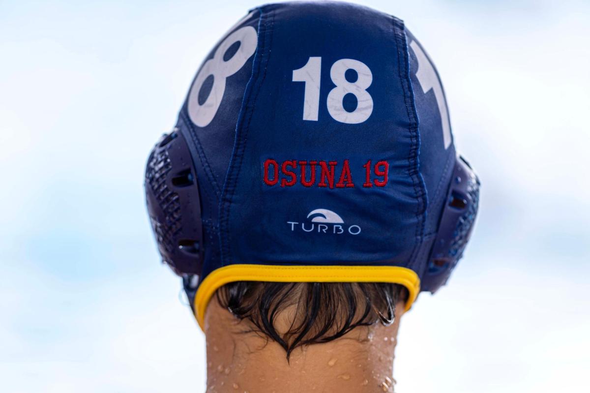 Miami, Florida, April 8, 2025 - A member of Belen’s Water Polo’s Team wears a cap with Lucas Osuna’s name on it during a match against Coral Gables High. The match was held at Gulliver Prep.
