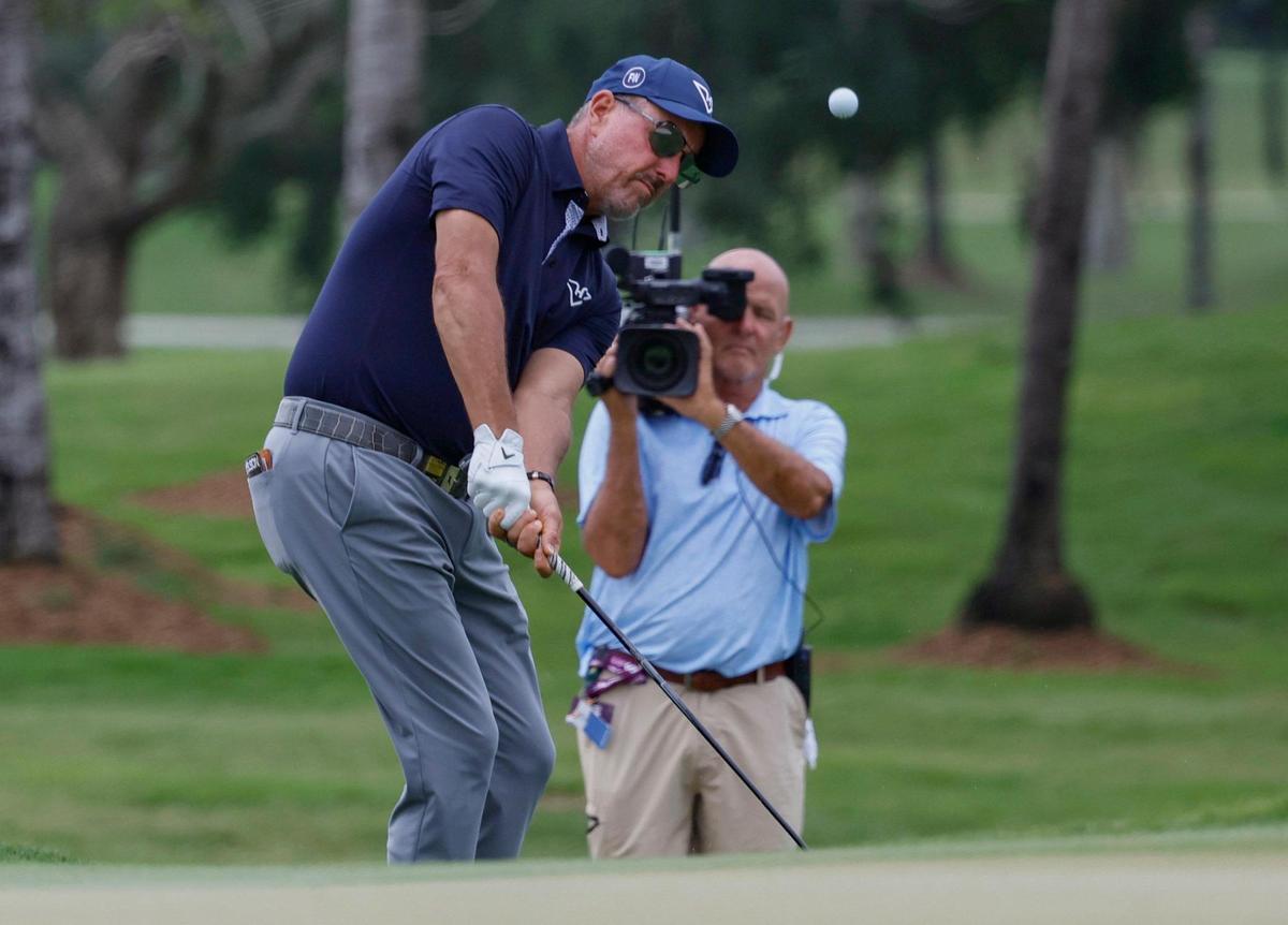 Phil Mickelson of Hyflyers GC hits the ball from the rough during LIV Golf Miami at Trump National Doral in Doral, Florida on Friday, April 4, 2025.