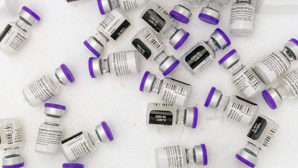 Vials of the Pfizer-BioNTech COVID-19 vaccine sit in a cooler before being thawed at a pop-up COVID-19 vaccination site in the Bronx borough of New York on Tuesday, Jan. 26, 2021.