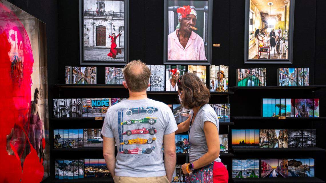 Art lovers check out the works at the 2022 Coconut Grove Arts Festival. The festival began in 1963 and has become one of Miami’s premiere outdoor events. This year’s festival runs throughout Presidents’ Day weekend.
