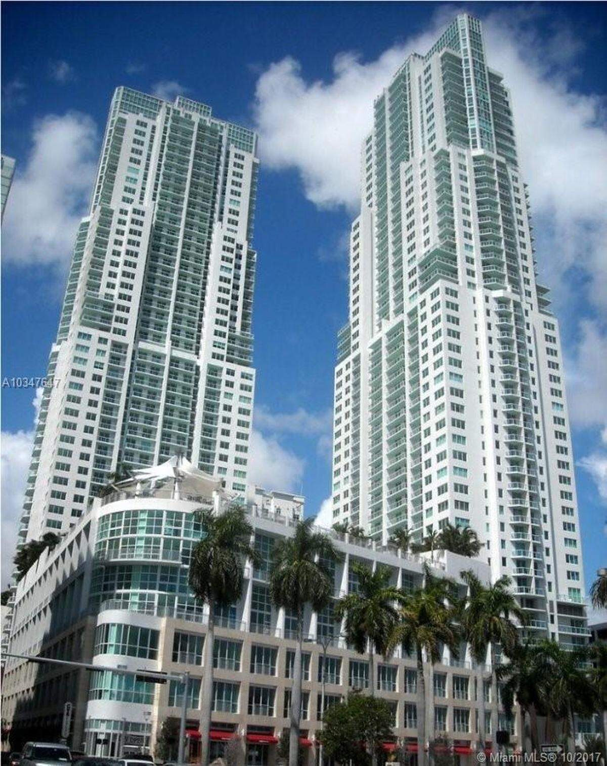 Twin towers rise above downtown Miami at Vizcayne Towers, pictured above, across the street from Bayside Marketplace and Bayfront Park. The 49-story buildings share four pools, movie theater, gym, and spa.