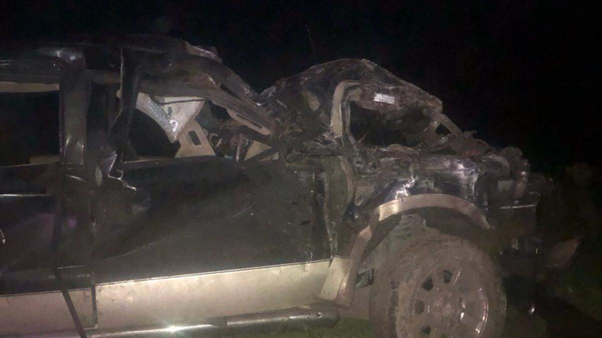 The aftermath of a pickup truck that crashed into a street sign in Glades County, flipped and ejected four of its six occupants.