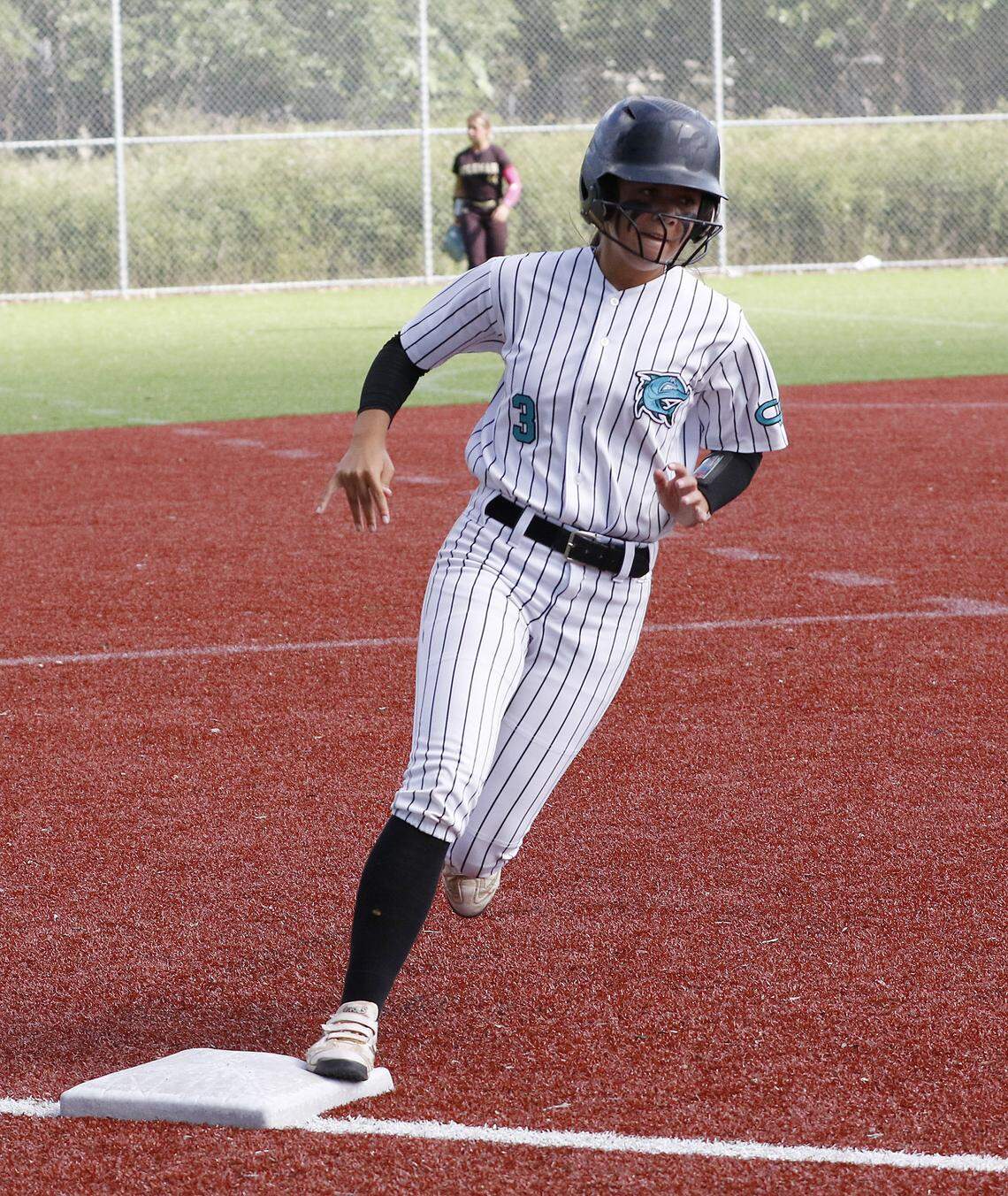 Coral Reef Barracudas Alicia Thomason (3) hits a third base during GMAC softball championship game against Goleman Gators on Friday, April 17, 2026 at JC Bermudez HS in Doral. Andrew Uloza / for Miami Herald