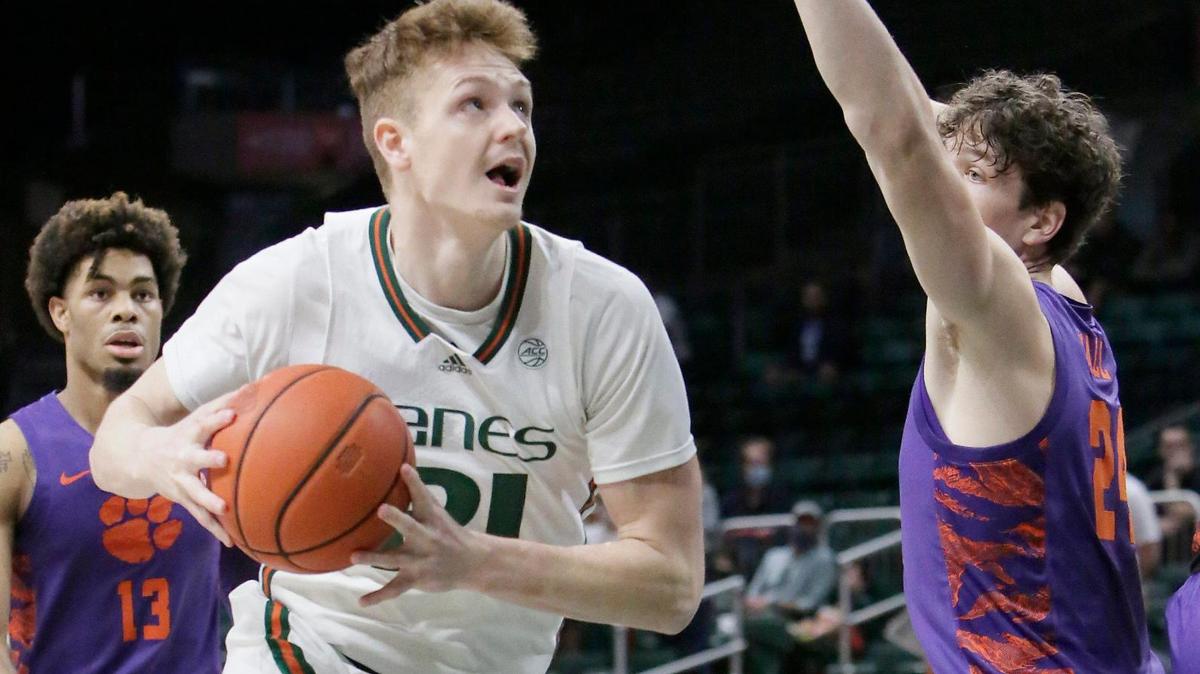 UM Hurricanes forward Sam Waardenburg (21) scored a career-high 18 points in an 80=75 win against the Clemson Tigers during ACC opener on December 4, 2021 at Watsco Center in Coral Gables. Andrew Uloza / for THE MIAMI HERALD