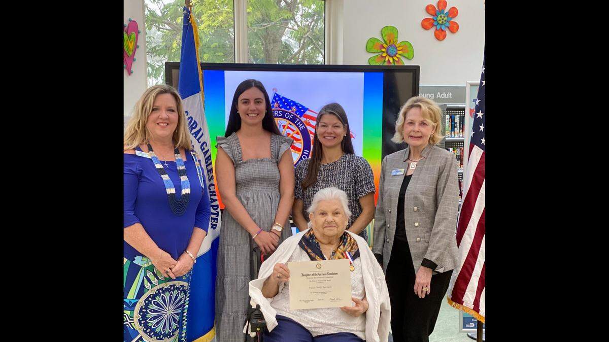 Dana Pezoldt, Regent of the Coral Gables DAR chapter; Sylver Gonzalez-Rivas, Dolly MacIntyre’s granddaughter; Sheffield Bessellieu, Dolly MacIntyre’s daughter; Becky Matkov, former director of Dade Heritage Trust; and Frances “Dolly” MacIntyre, the recipient of the national DAR Historic Preservation Award.