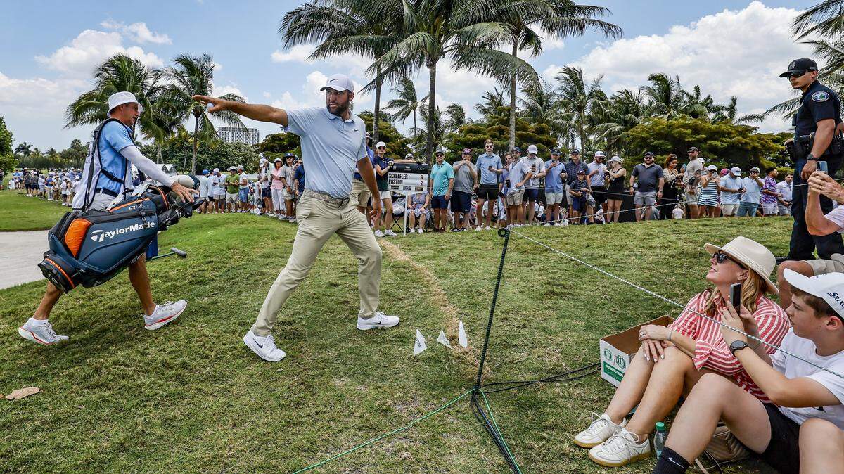 Scottie Scheffler points towards hole 6 on his way to to tee off at hole 7 during round three of the 2026 Cadillac Championship at Trump National Doral in Doral, Florida, on Saturday, May 2, 2026.