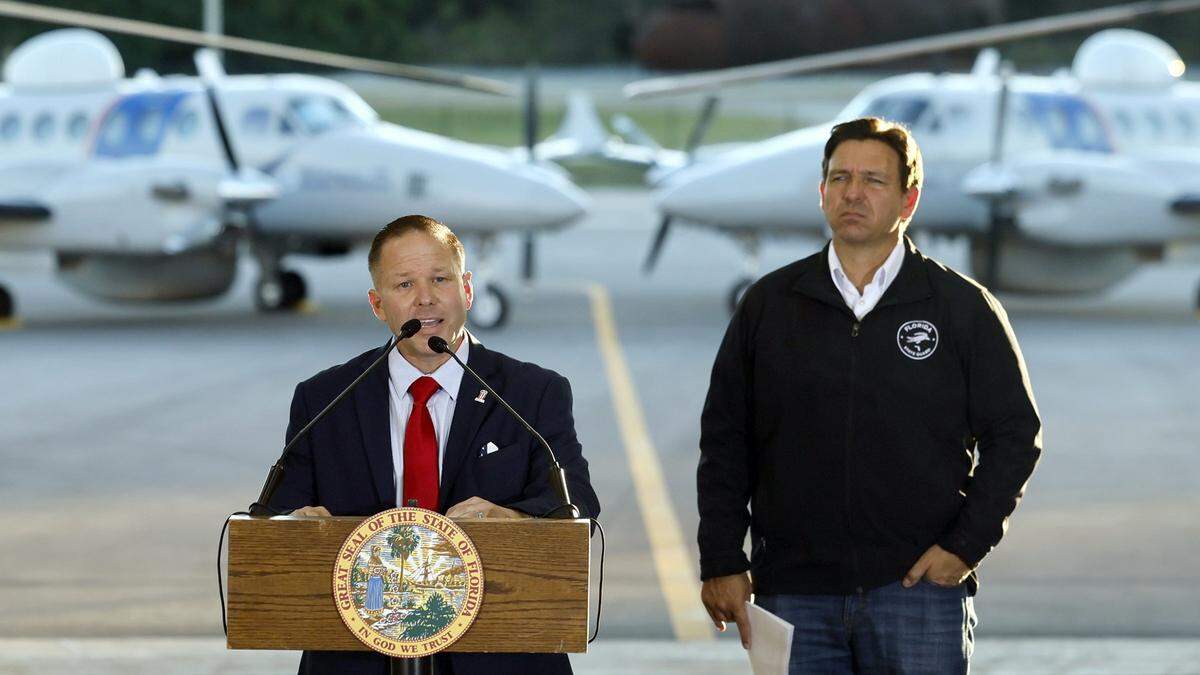 Homeland Security Senior Counselor Keith Pearson speaks during a media conference with Florida Gov. Ron DeSantis at the Homestead Air Reserve Base in Homestead, Florida on Wednesday, Feb. 26, 2025.