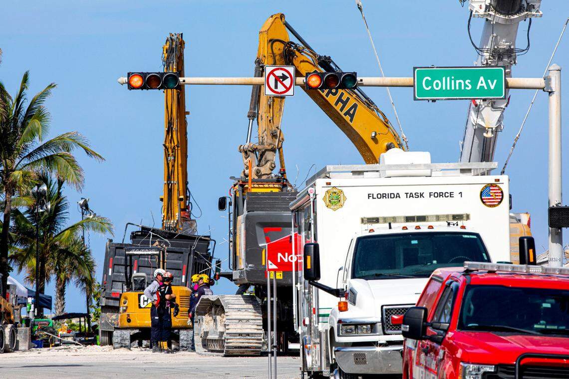 First responders search through the rubble of the Champlain Towers South collapse site, one day after a shift from search-and-rescue to recovery, in Surfside, Florida, on Thursday, July 08, 2021.