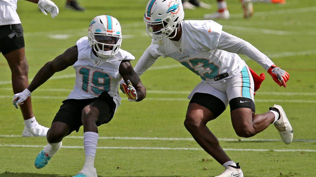 Miami Dolphins wide receivers Jakeem Grant (19) and Kirk Merritt (83) during a drill at their training camp in Davie Florida, Wednesday, November 4, 2020.