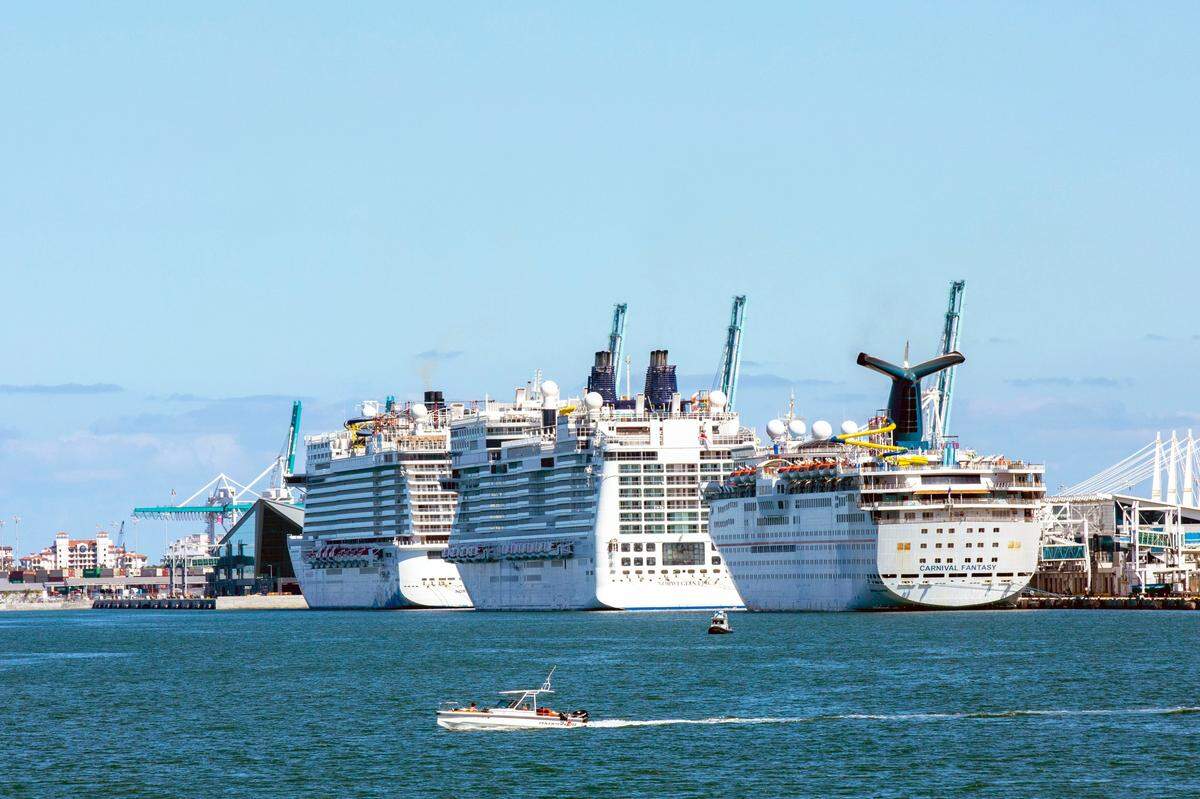 Cruise ships are docked and lined up at Port of Miami in Miami, Florida, on Monday, May 4, 2020.