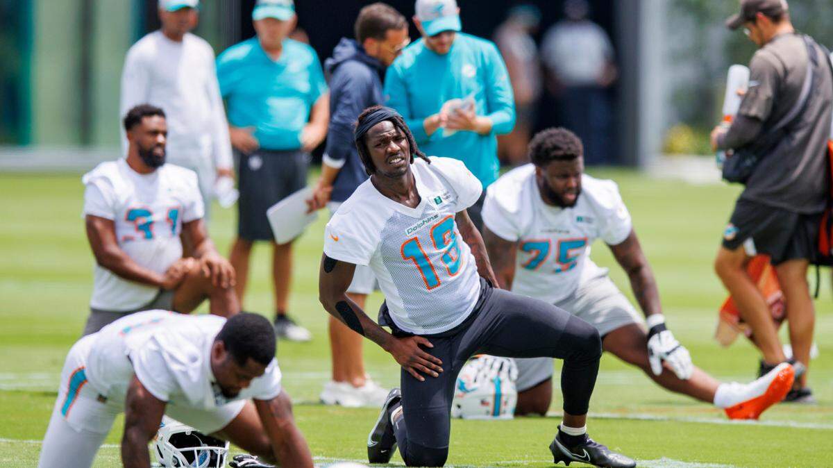 Miami Dolphins wide receiver Preston Williams (18) stretches during the NFL football team’s organized team activities at Baptist Health Training Complex in Hard Rock Stadium on Tuesday, May 24, 2022 in Miami Gardens, Florida, in preparation for their 2022-23 NFL season.