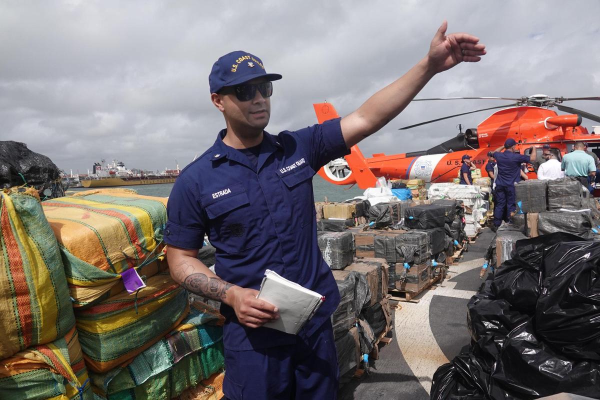 More than a billion dollars’ worth of drugs seized at sea is displayed on the flight deck of the U.S. Coast Guard Cutter James on Thursday, Feb. 17, 2022. The 54,000 pounds of cocaine and 15,800 pounds of marijuana seized in the Pacific and Caribbean were offloaded at Port Everglades.