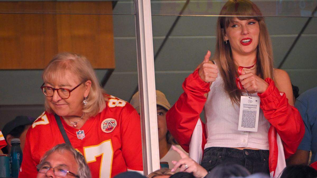 Donna Kelce and Taylor Swift watch a Kansas City Chiefs game.