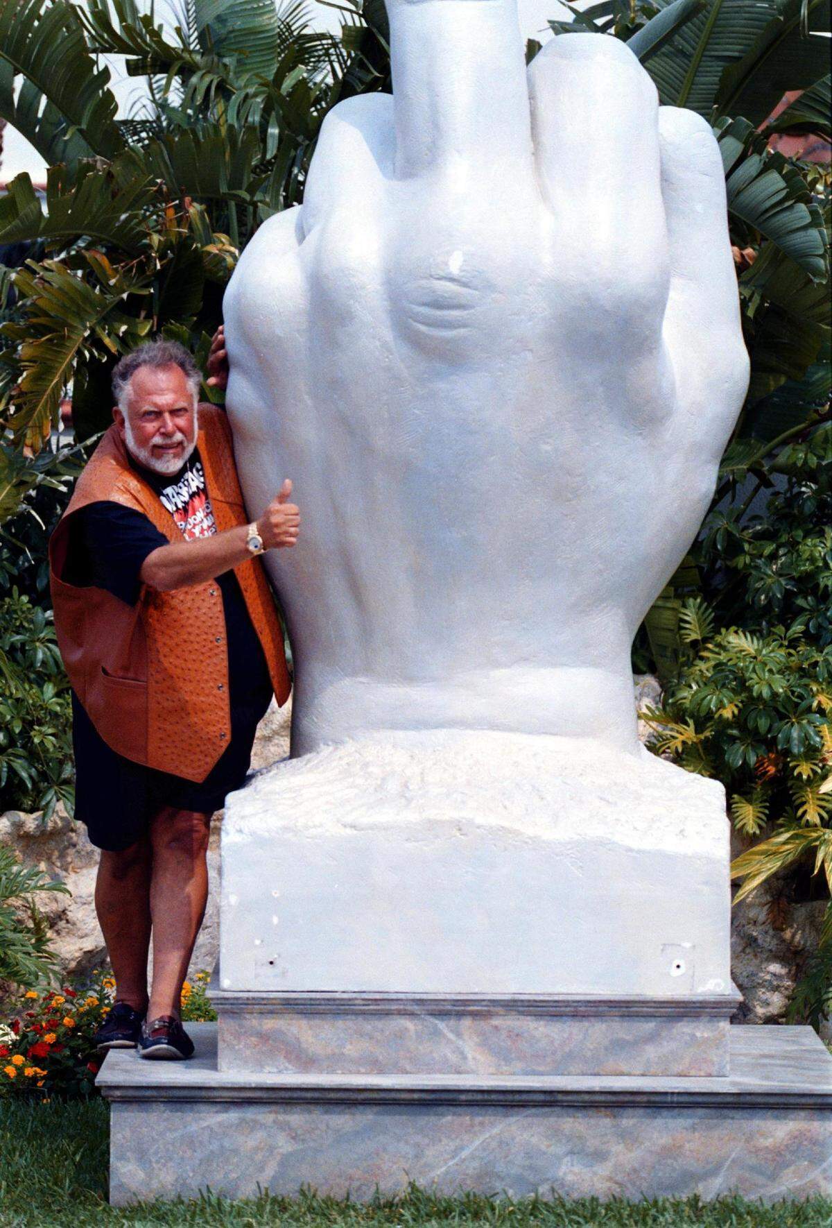 Al Goldstein, publisher of Screw Magazine, bought this giant foam statue of a hand shooting a bird to display in his backyard on the Intracoastal waterway in Pompano Beach.