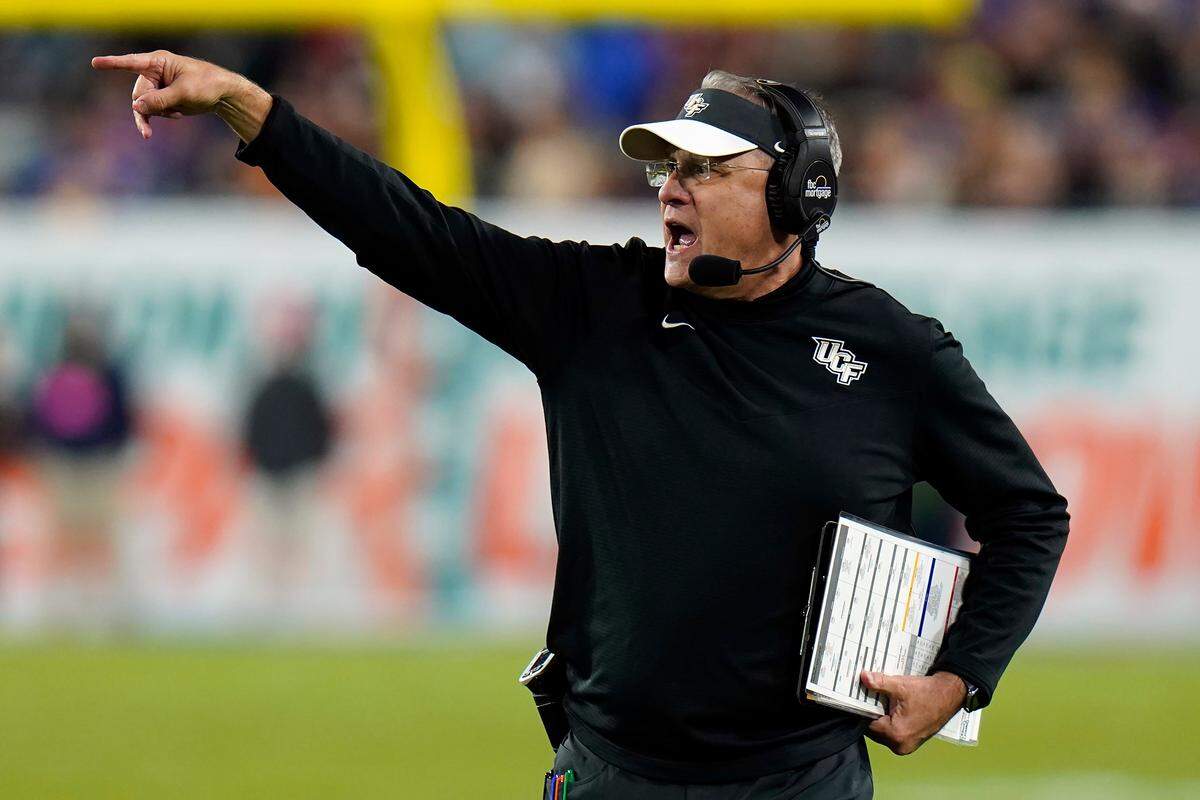 Central Florida head coach Gus Malzahn calls a play during the second half of the Gasparilla Bowl NCAA college football game against Florida Thursday, Dec. 23, 2021, in Tampa, Fla.