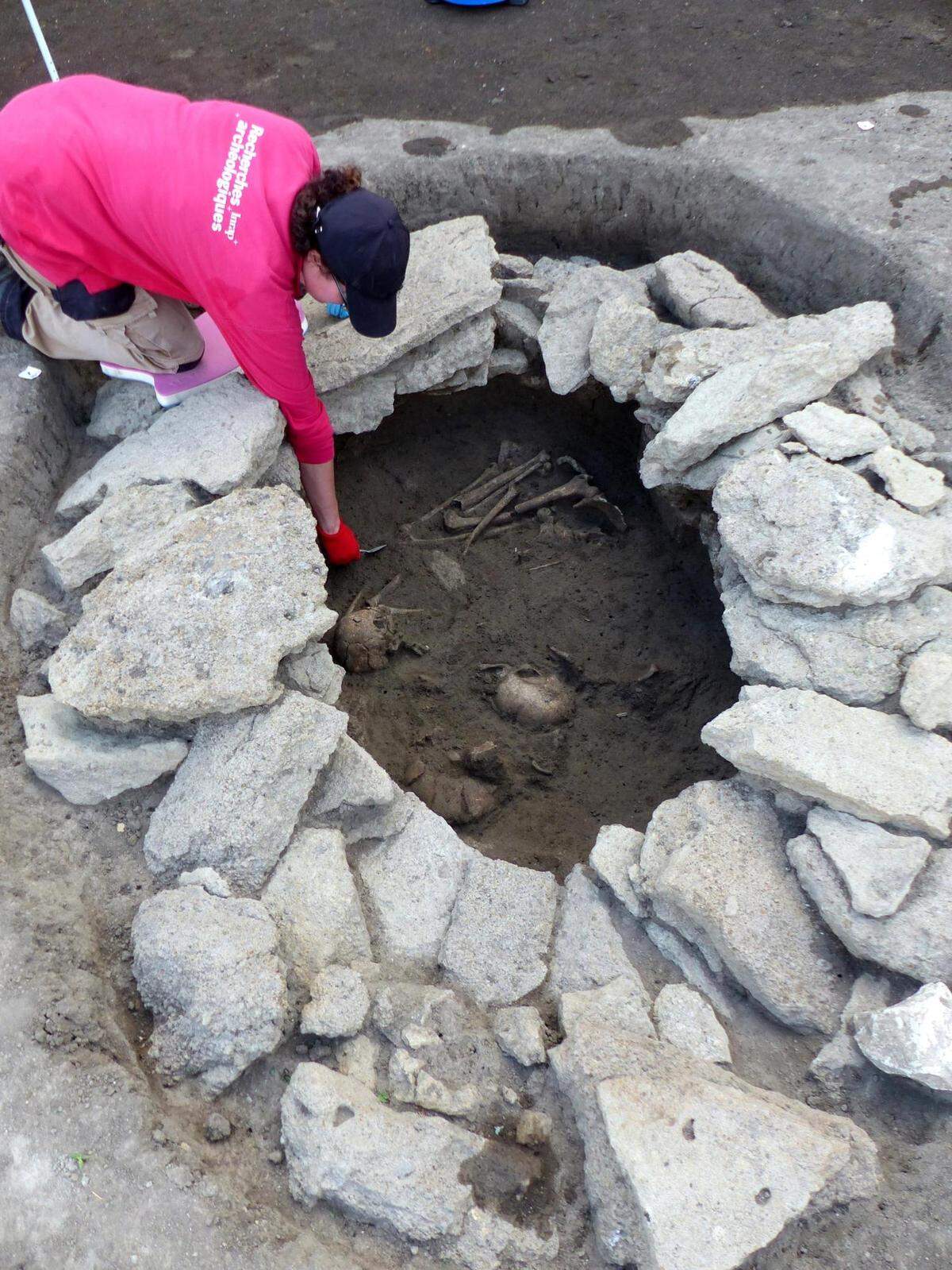 The pit grave was covered by intricate stone architecture.