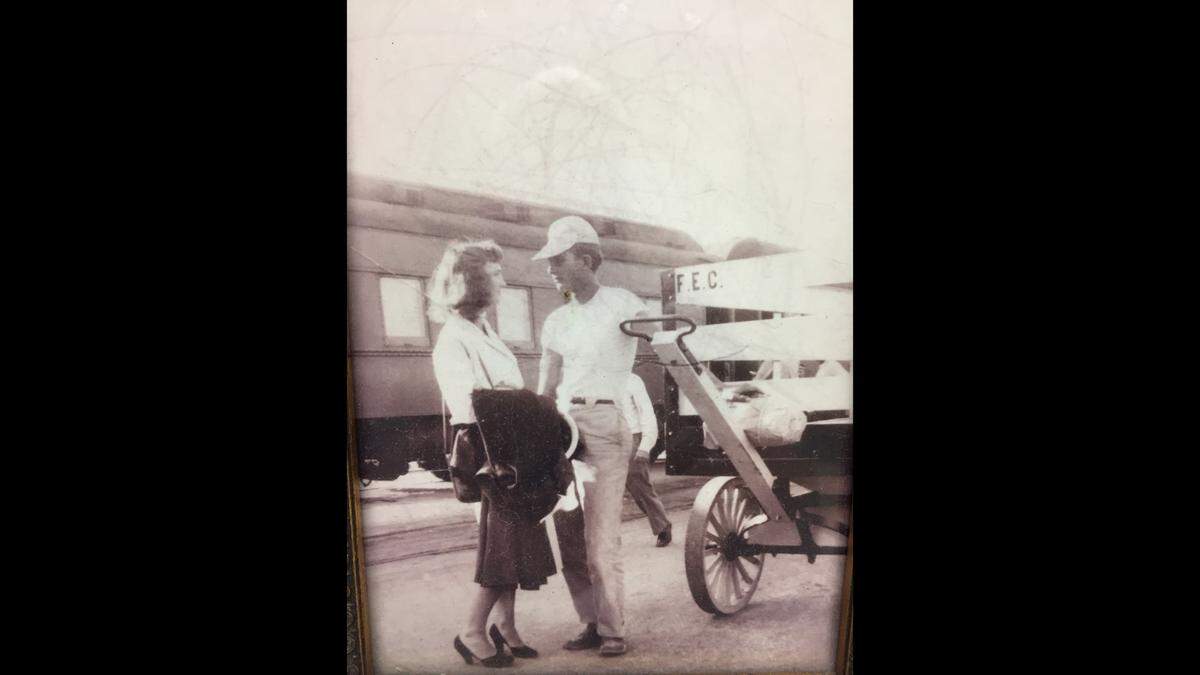 Larry Adams and his wife Betsy at a Downtown Miami train station in 1951 on the week they met. They were saying their goodbyes as she was headed back to Washington D.C.