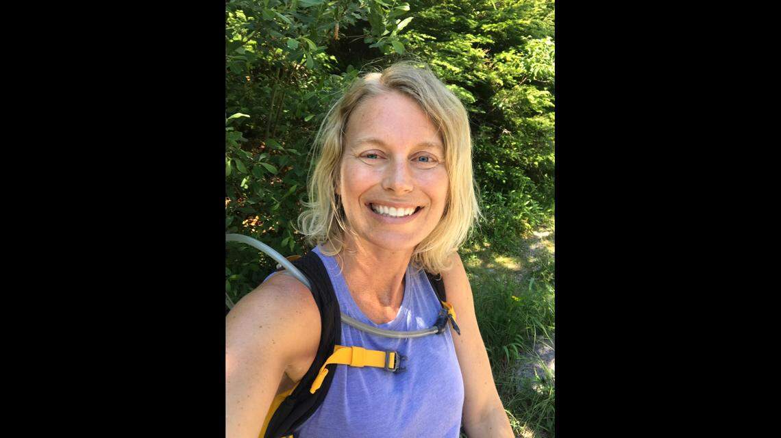 Joan Bauman, 45, training for a marathon in July 2018. She had gone through three rounds of chemotherapy in her breast cancer treatment prior to this picture and had one more round to go. After she finished her treatment at Sylvester Comprehensive Cancer Center, she ran a 50K, or 32-mile race.