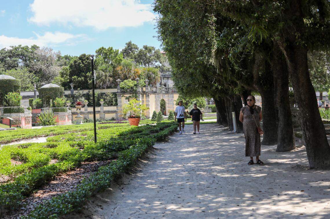 Visitors walk through the the European-inspired manicured gardens at Vizcaya Museum and Gardens on May 19.